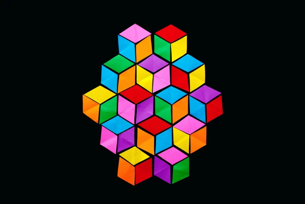 Colorful geometric cube pattern on a black background.