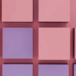 A grid of pink and purple 3D cubes arranged on a soft pink background, creating a modern and minimalist visual composition.