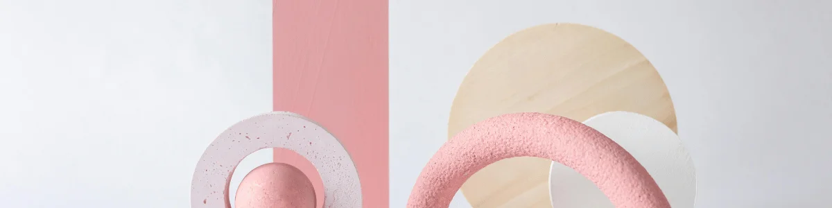 Abstract composition featuring pink and white geometric shapes against a light background, conveying a modern and artistic vibe.