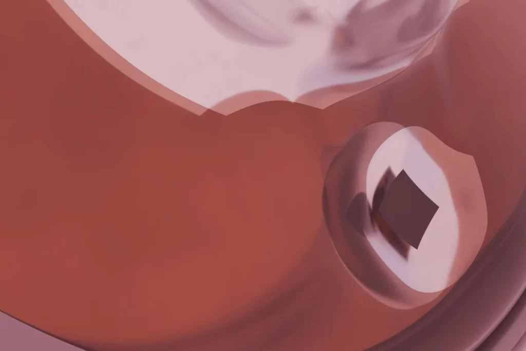 Abstract close-up of fluid shapes in warm red tones, featuring a reflective bubble with a dark square at its center.