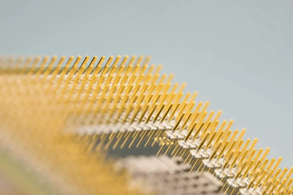 A detailed abstraction of microelectronics with a focus on symmetry and metallic sheen.