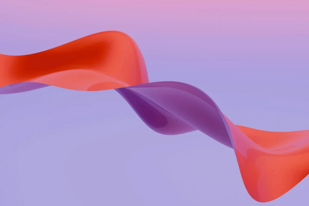 Curved vibrant waves in red and purple blending together
