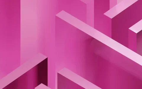 Abstract design featuring layered, 3D pink geometric shapes creating a vibrant and modern aesthetic.