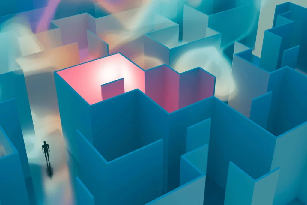 A person walking through a futuristic maze, with illuminated walls in shades of blue and pink.