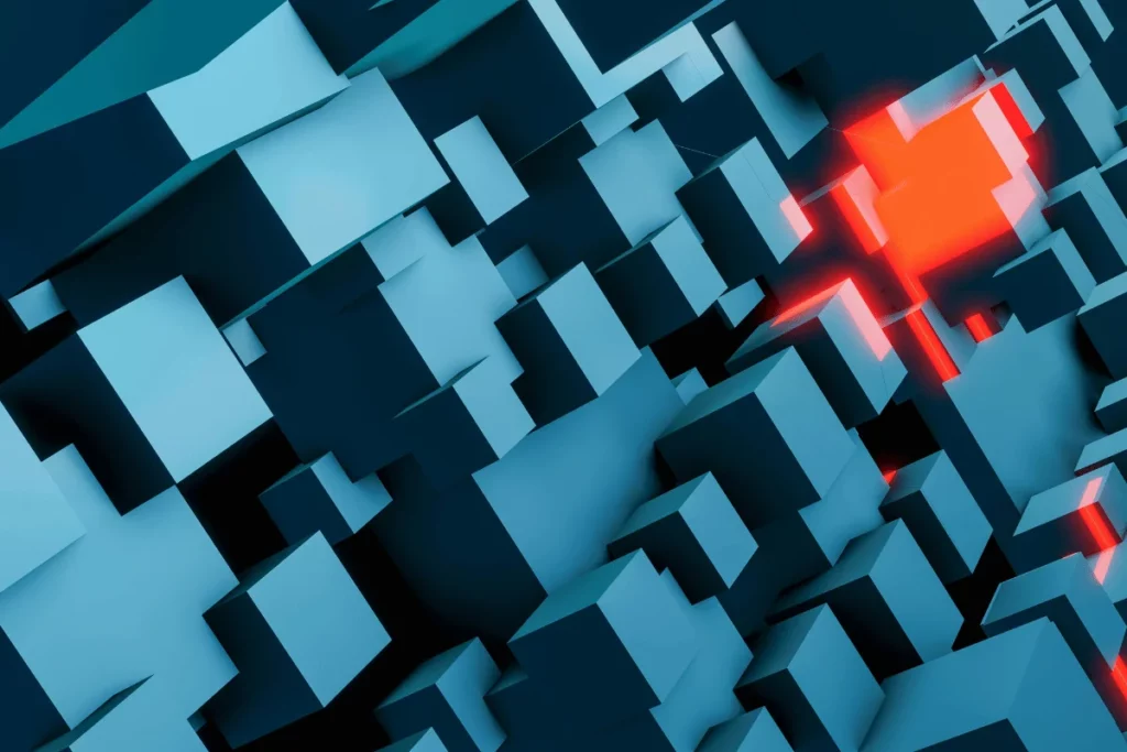 Abstract geometric design with scattered blue cubes and a striking red highlight.