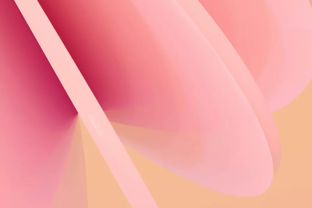 Abstract soft pink and peach curves overlapping with a smooth, glossy finish, creating a minimalistic yet elegant design.