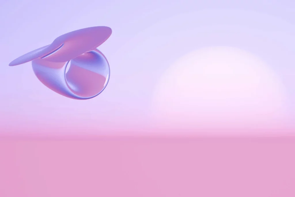 A delicate translucent shape suspended in the air, surrounded by a serene gradient of soft pink and purple tones.