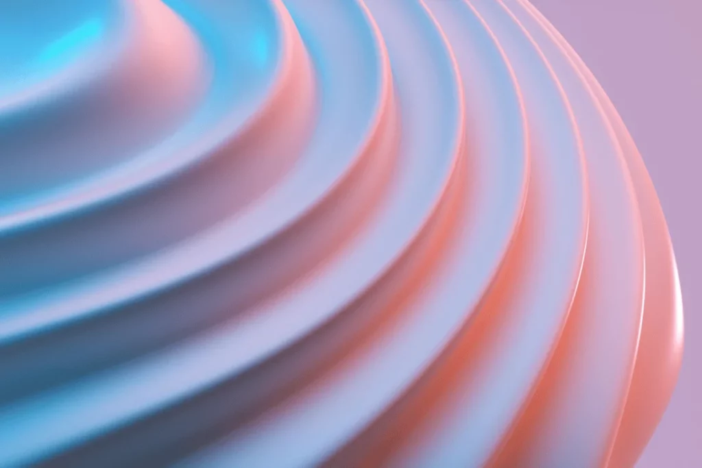 Close-up of smooth, curved concentric waves in a soft blue and orange gradient.