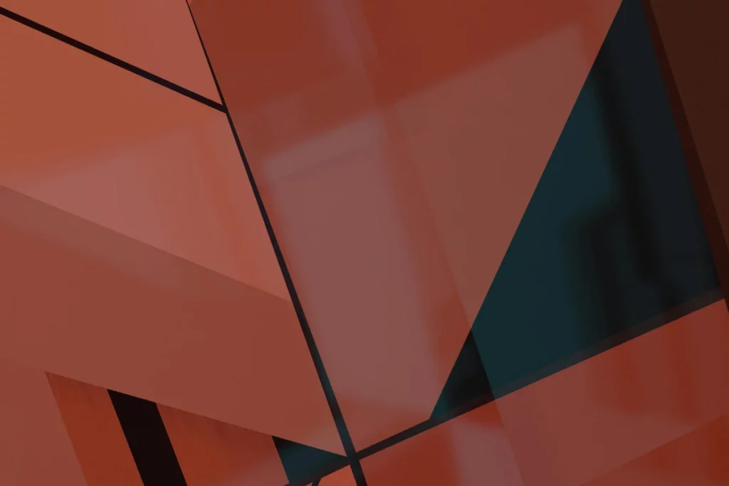 Abstract geometric composition featuring layered red and black shapes with a glossy texture, creating a modern and dynamic visual effect.