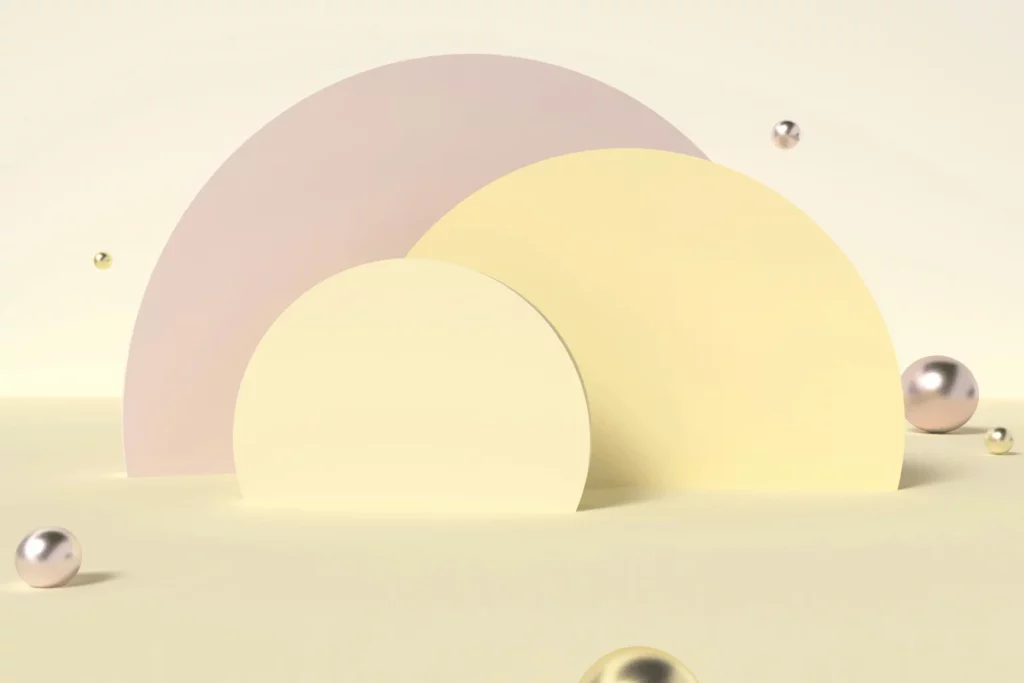 Abstract 3D shapes with pastel semicircles and floating metallic spheres.
