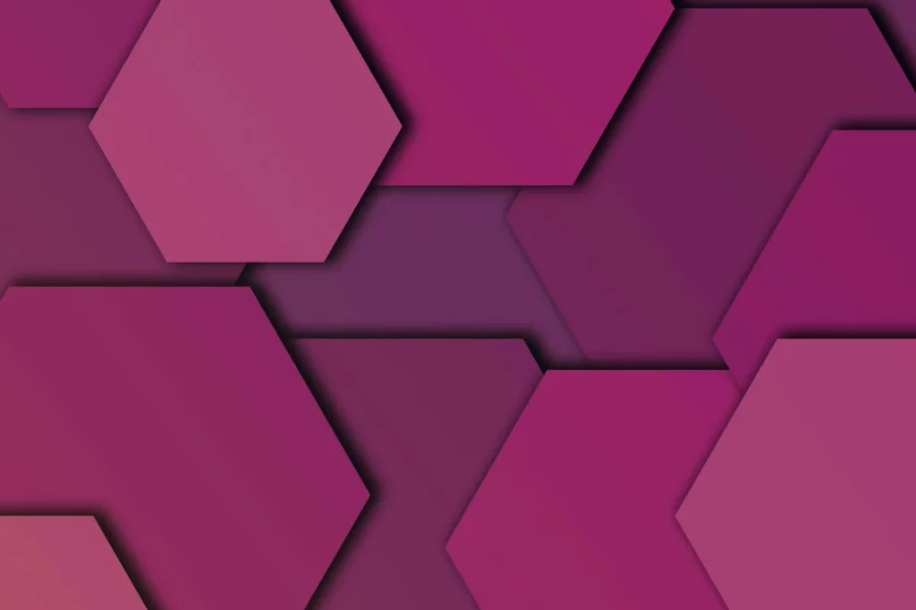Close-up of hexagonal patterns in gradient pink hues creating a modern digital design