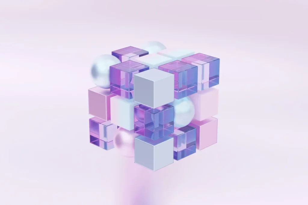 3D pastel cube structure with glass and pearl-like elements.