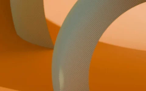 Abstract composition of curved shapes in soft beige and orange tones, creating a smooth, flowing visual texture.